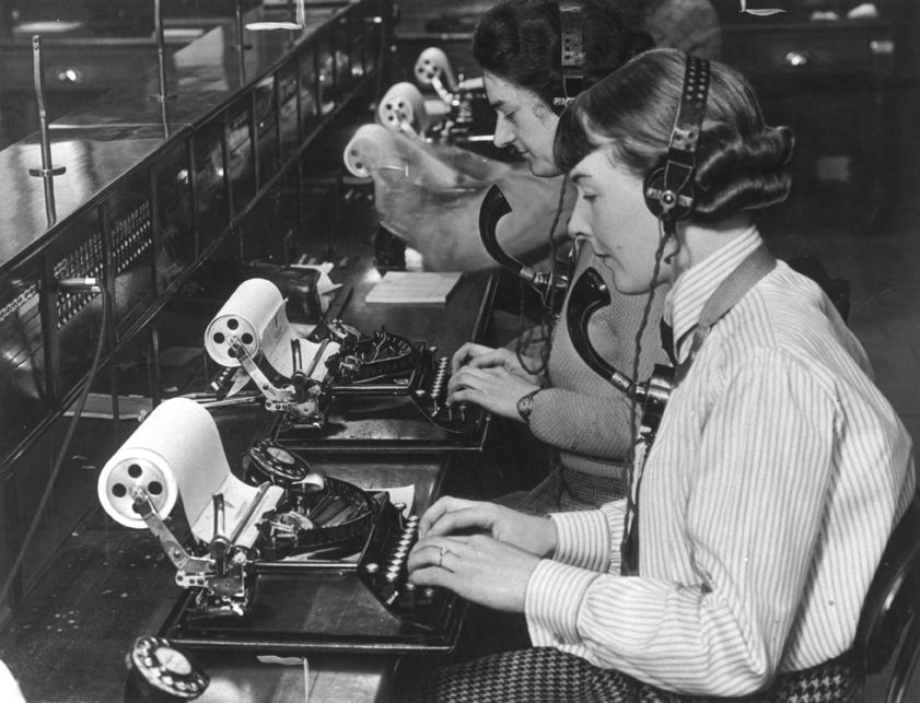 Telegram operators transpose messages on to typewriters, 1 June 1935.