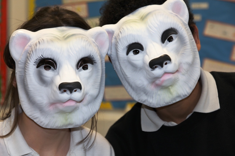 Students from Penryn School in polar bear masks for a performance in At-Bristol. Image credit: Science Museum