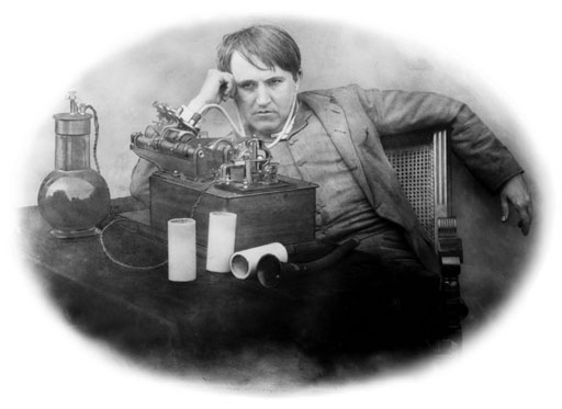Edison stares intently at his new invention - Credit: Science and Society Picture Library