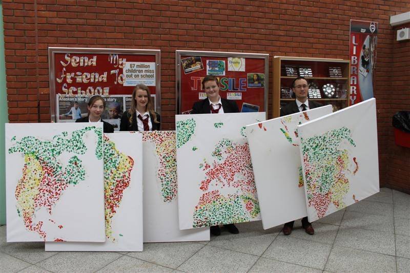 Students from Shenley Brook End School with the results of their paintball workshop. Image credits: Science Museum