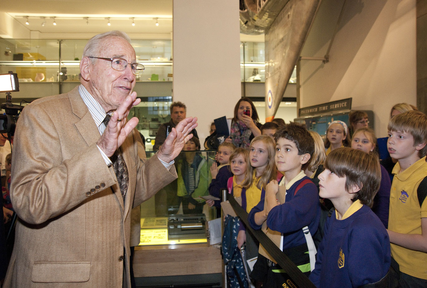 Astronaut Jim Lovell meeting school children at the Science Museum.