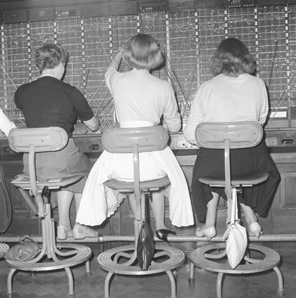 Telephone operators busy at work at Enfield Telephone Exchange in 1960
