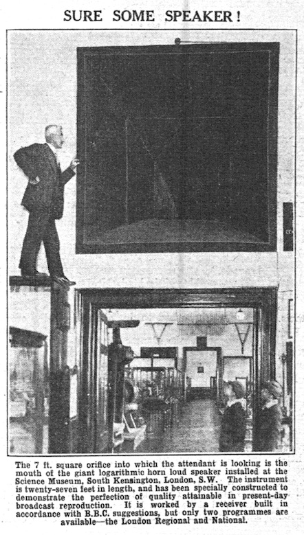 The horn’s mouth over the entrance to the Radio Communication gallery is shown by a museum attendant standing on a showcase! From Popular Wireless, October, 1930. Credit: British Library
