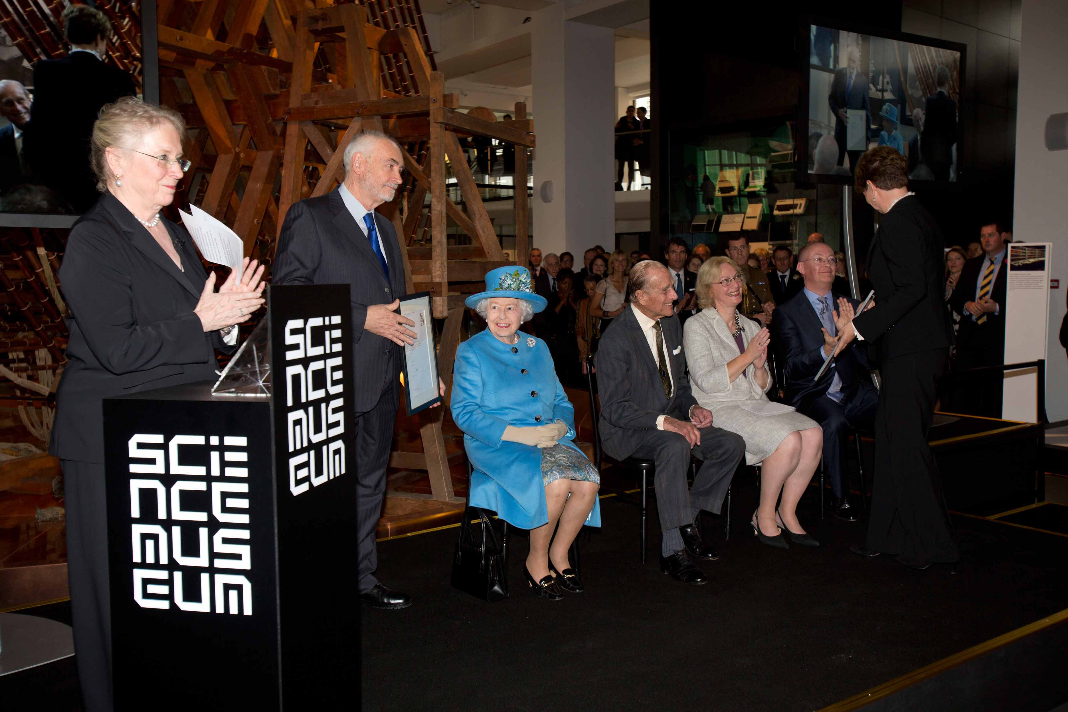 The Queen is presented with a Science Museum Fellowship at the opening of the Information Age gallery. Image credit: Tim Anderson