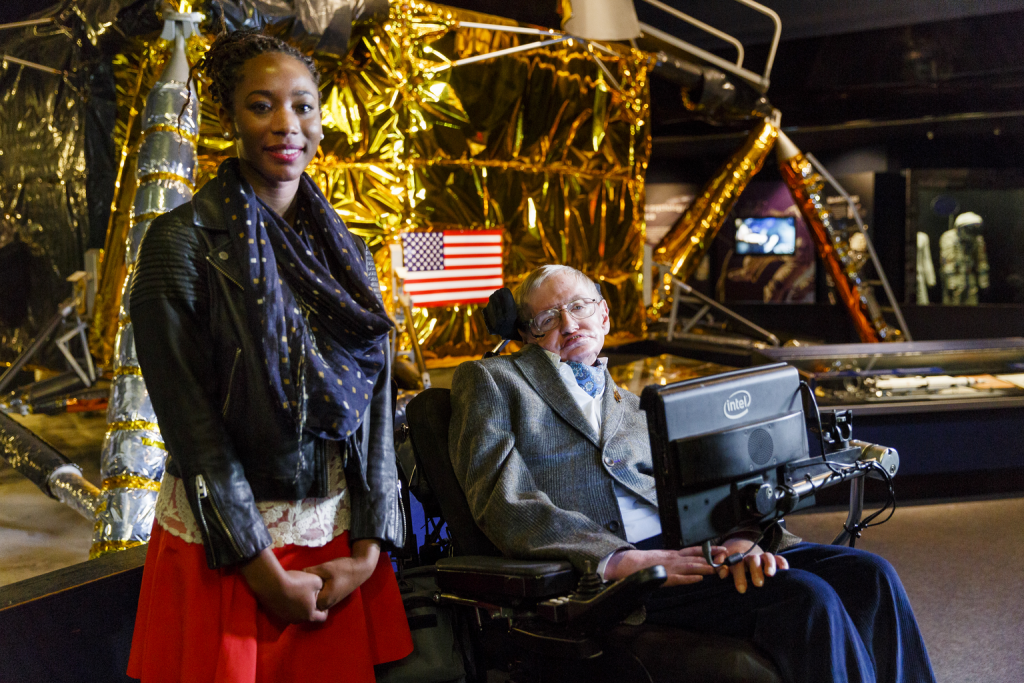 Professor Hawking and Adaeza in front of a model of the Apollo 11 Lunar Lander