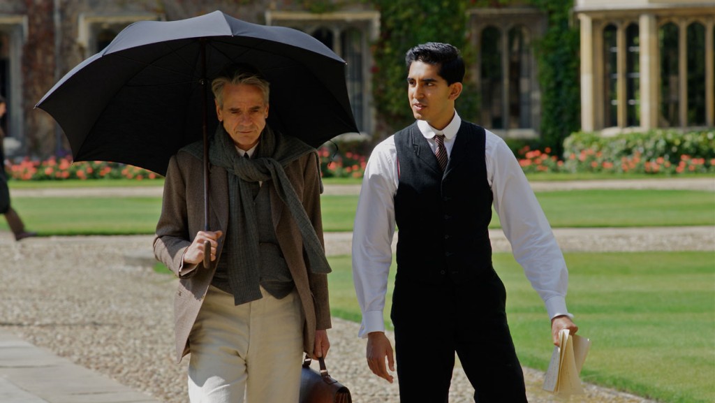 Hardy, played by Jeremy Irons and Dev Patel is Ramanujan. Credit: Warner Brothers
