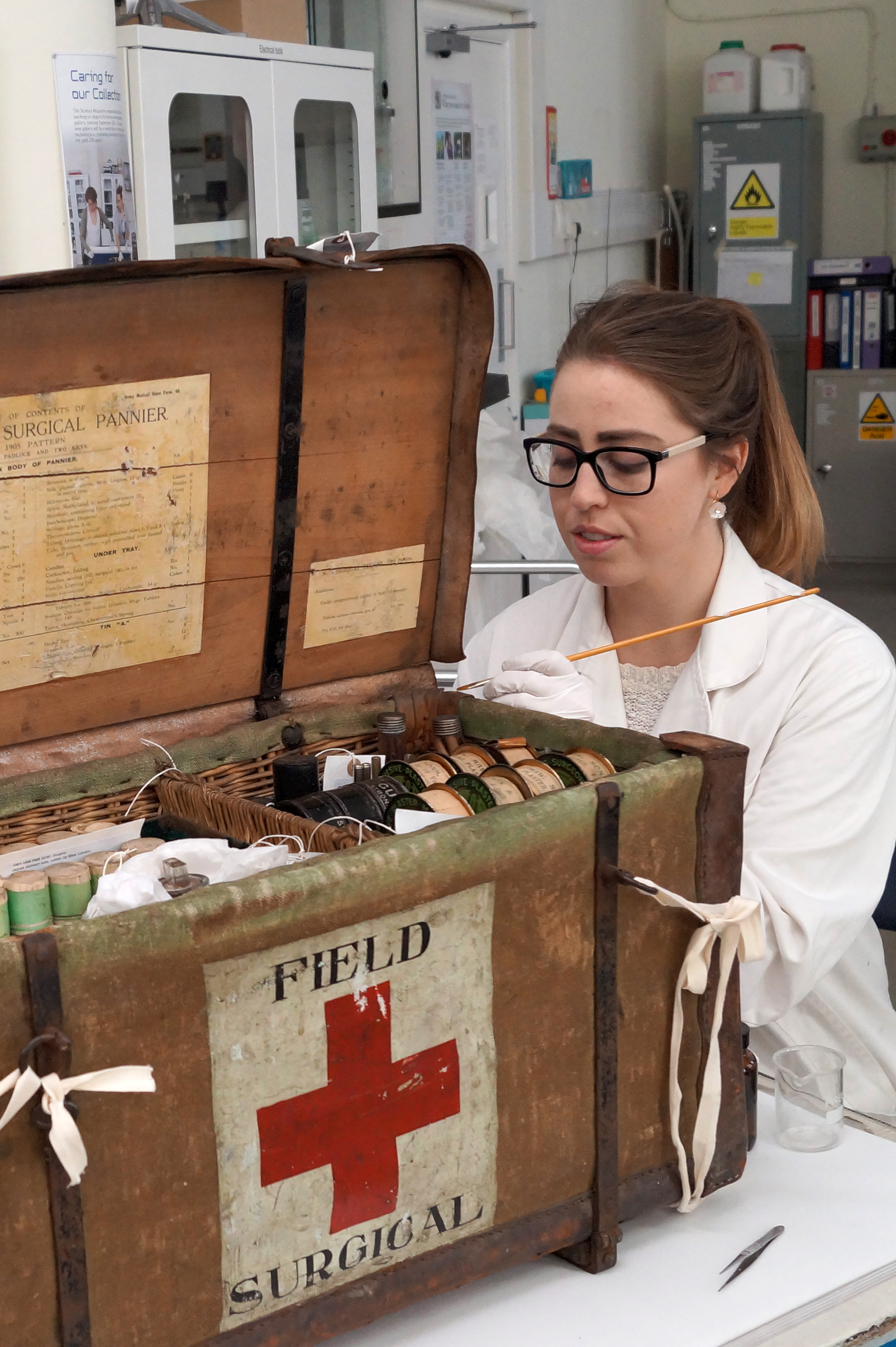 Vanessa at work conserving the field surgical pannier set. Credit: Science Museum
