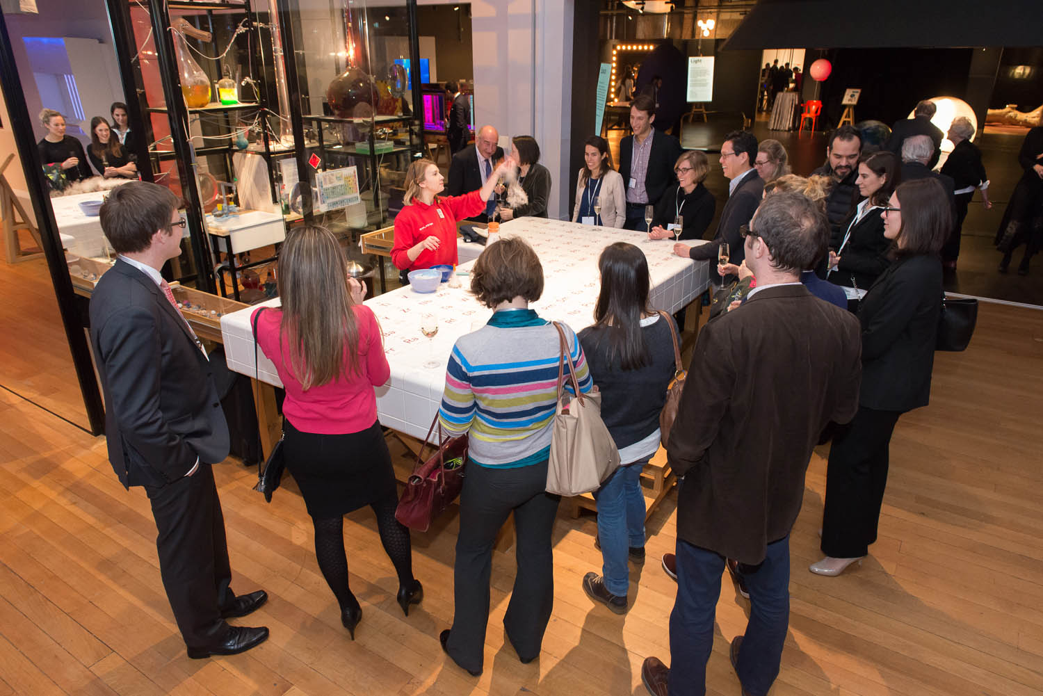 Guests being given a demonstration at the Chemistry Bar by Science Museum Explainer Phoebe.