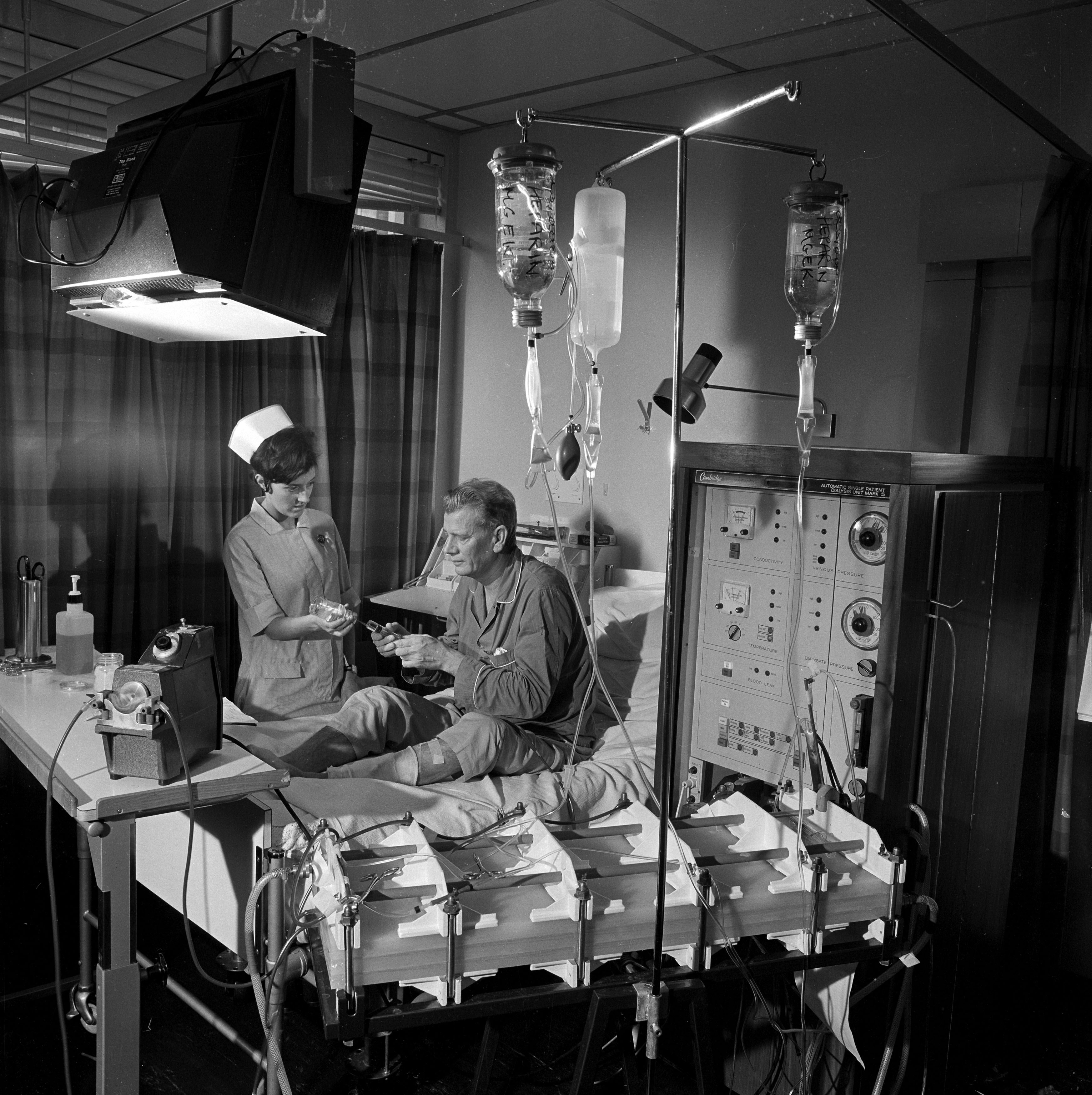 Royal Free Hospital Renal Unit patient and nurse with dialysis machine, 1968.