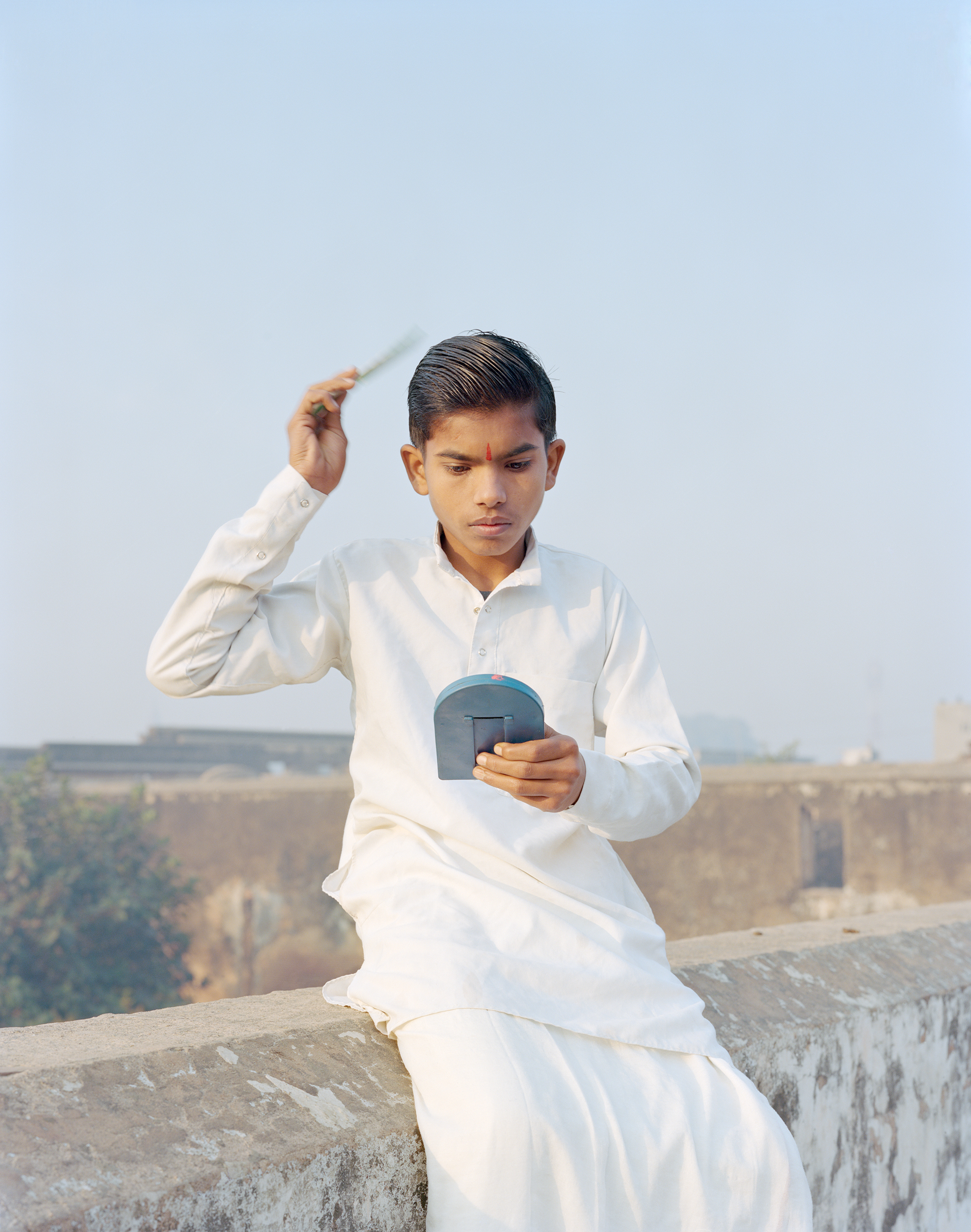Rama Combing His Hair, Ayodhya, Uttar Pradesh, India, 2015, from the series A Myth of Two Souls (2013 -)