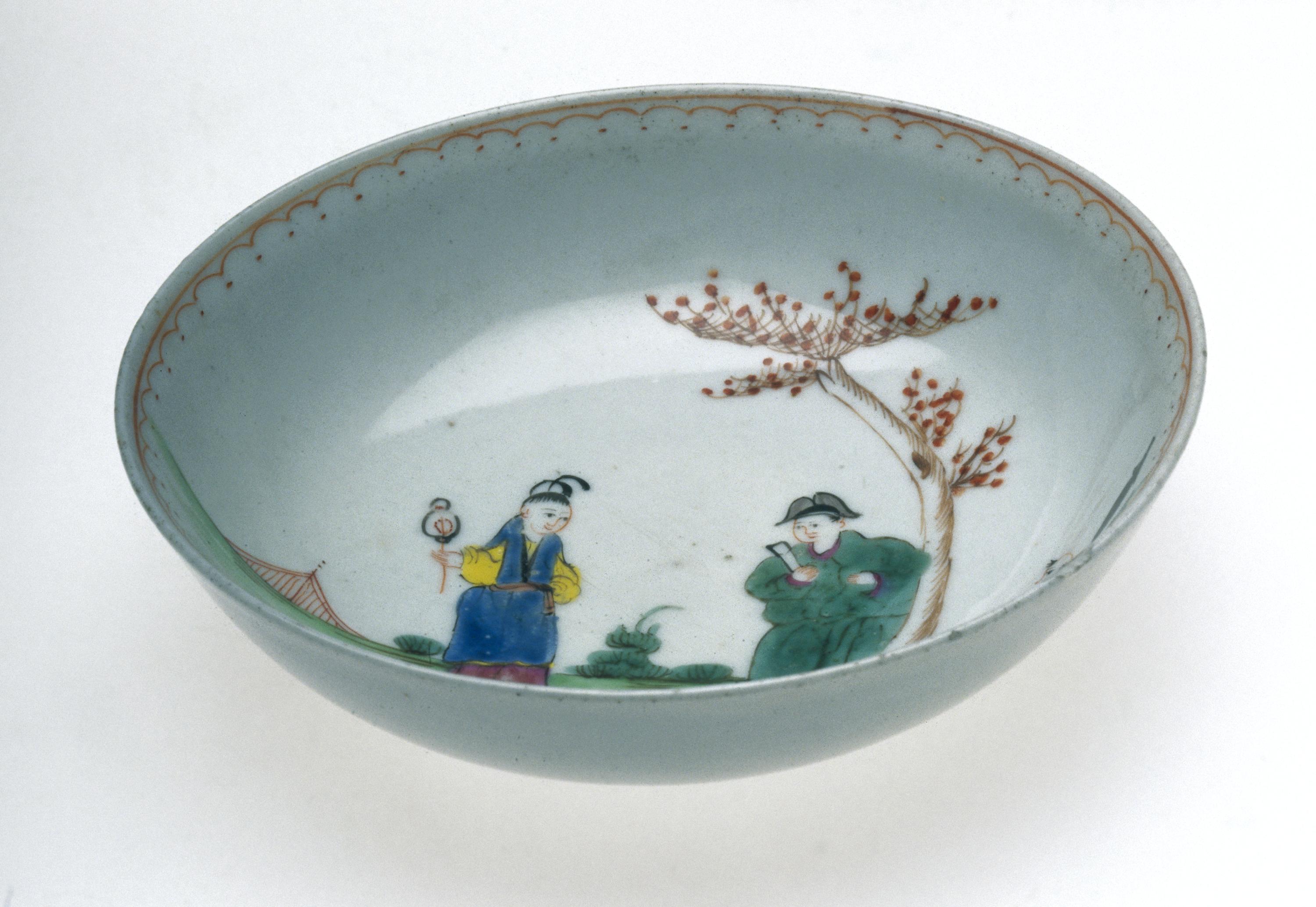 Porcelain saucer painted with Chinese figures and landscape