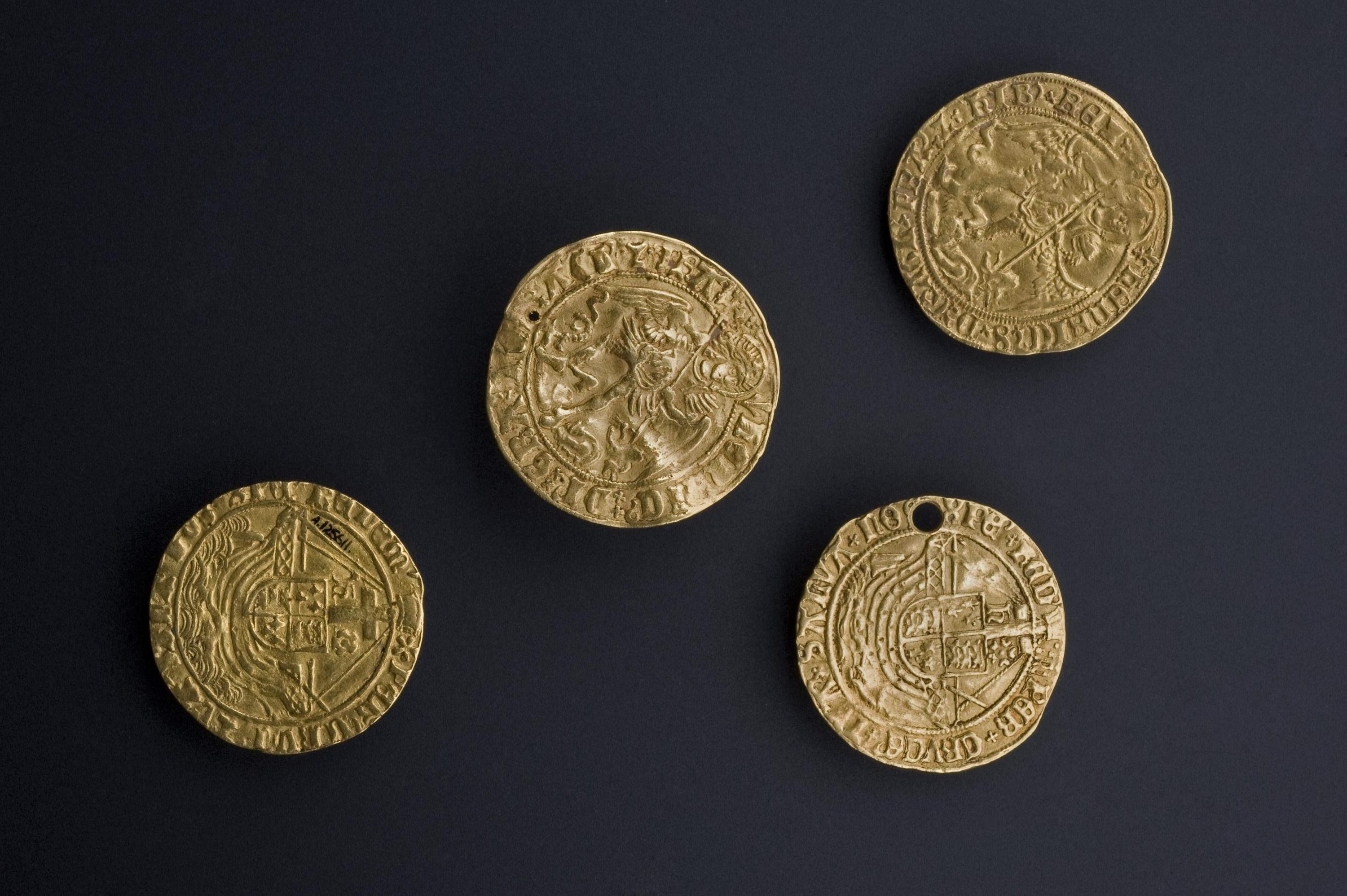 Four Gold Angel coins. Touchpieces in the ceremony of healing by touch. 