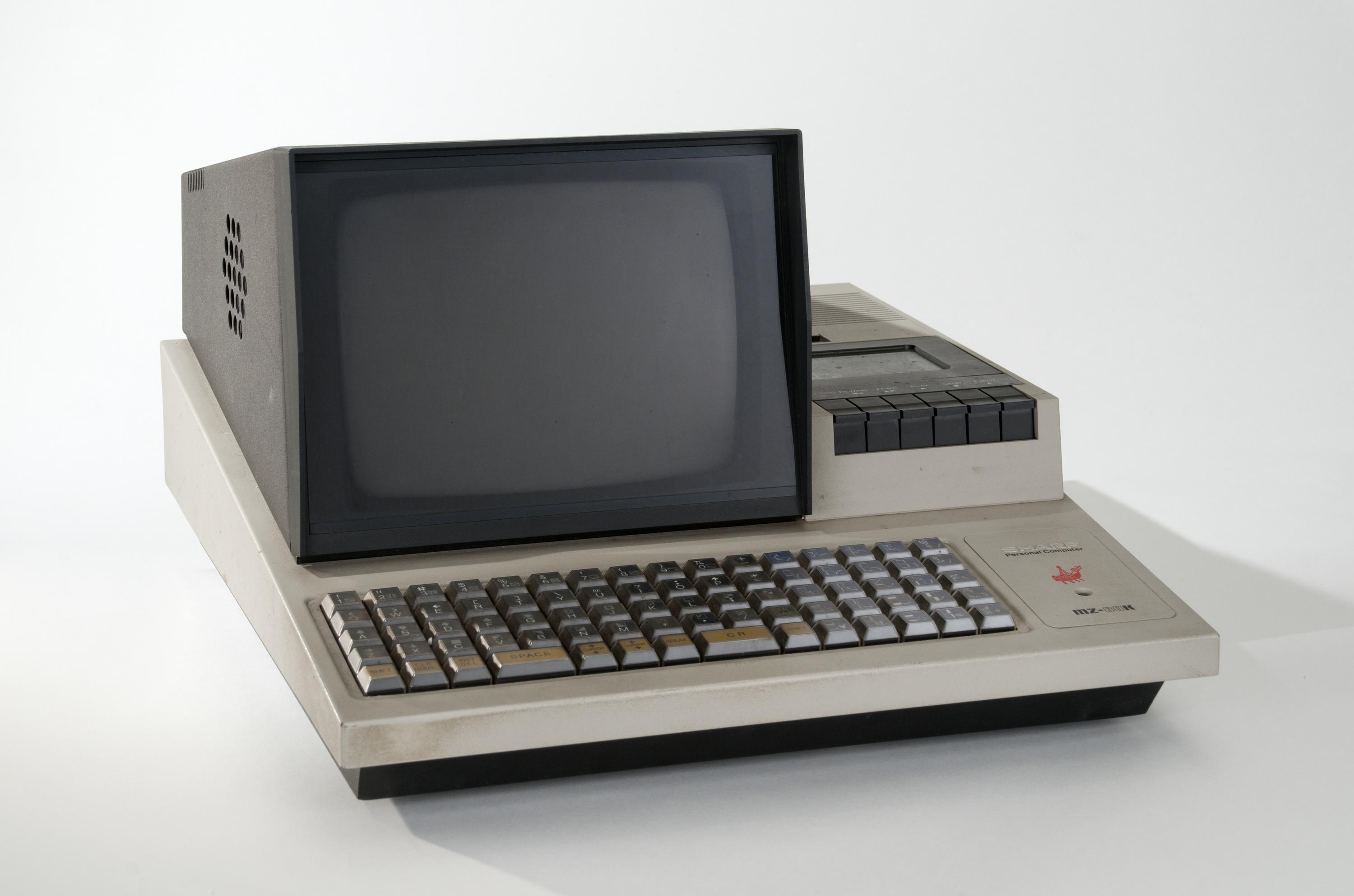 Sharp MZ-80K personal computer complete with floppy disc drive with instructions in original packaging, manufactured by Sharp Corporation in 1979