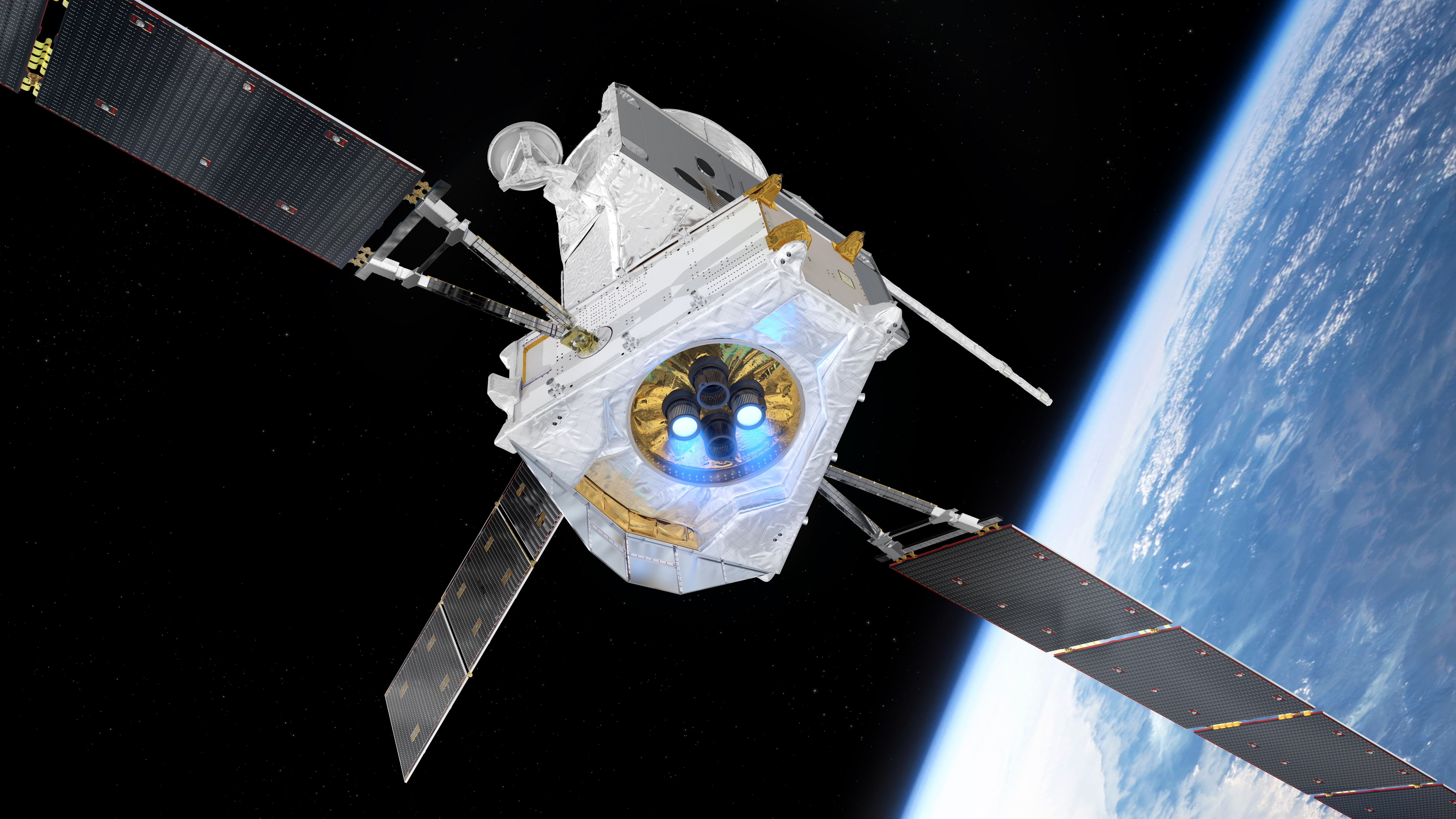 Artist’s impression of the BepiColombo spacecraft in cruise configuration, flying past Earth. The Mercury Transfer Module is shown with two ion thrusters firing