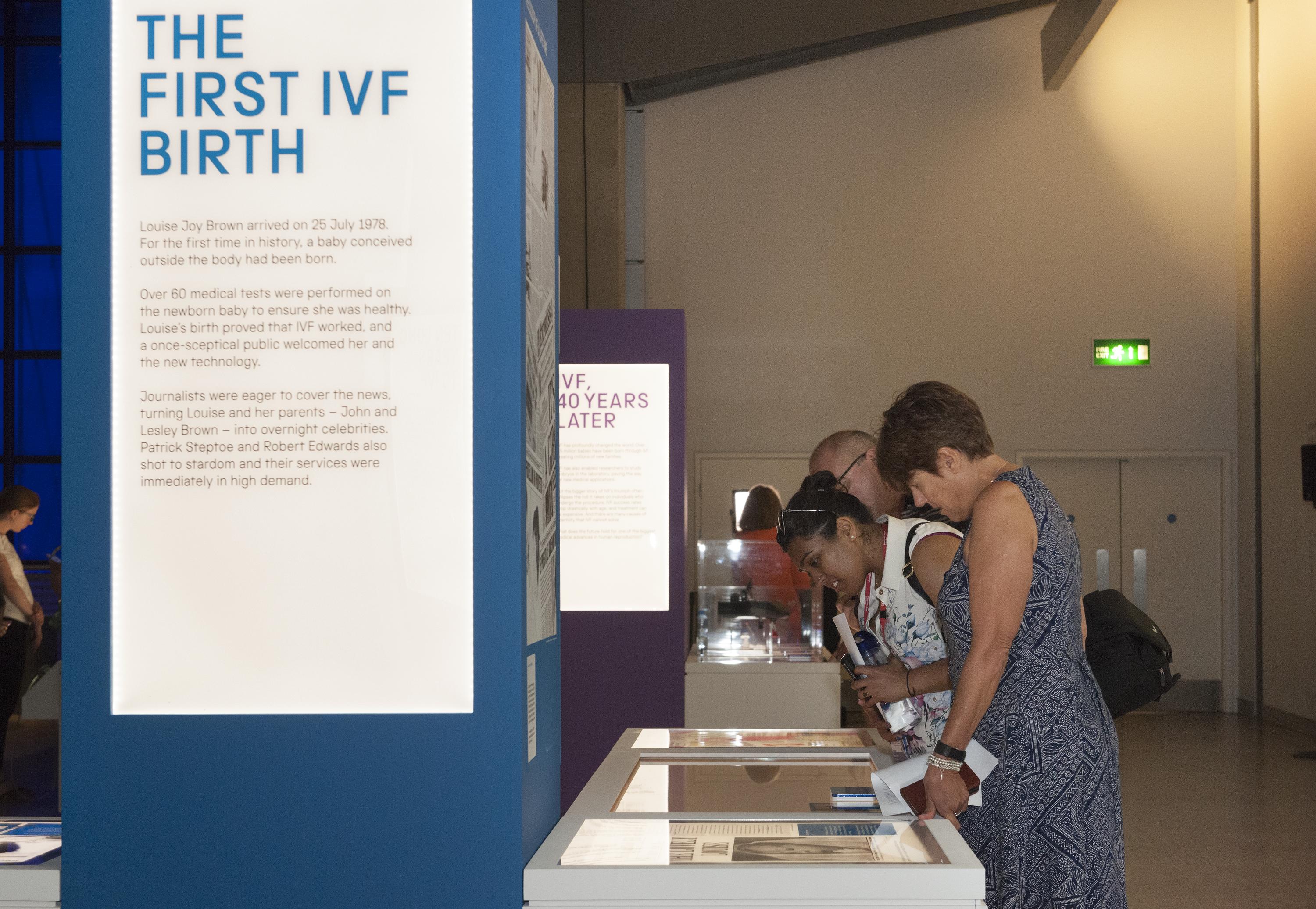 Invited guests attending IVF: 6 Million Babies Later. An exhibition marking the 40th anniversary of the 'miraculous' birth of Louise Brown on 25 July 1978. The exhibition explores the ten years of testing, hundreds of failed attempts and many setbacks faced by Robert Edwards, Patrick Steptoe and Jean Purdy, in their quest to treat infertility and achieve the first successful IVF birth.