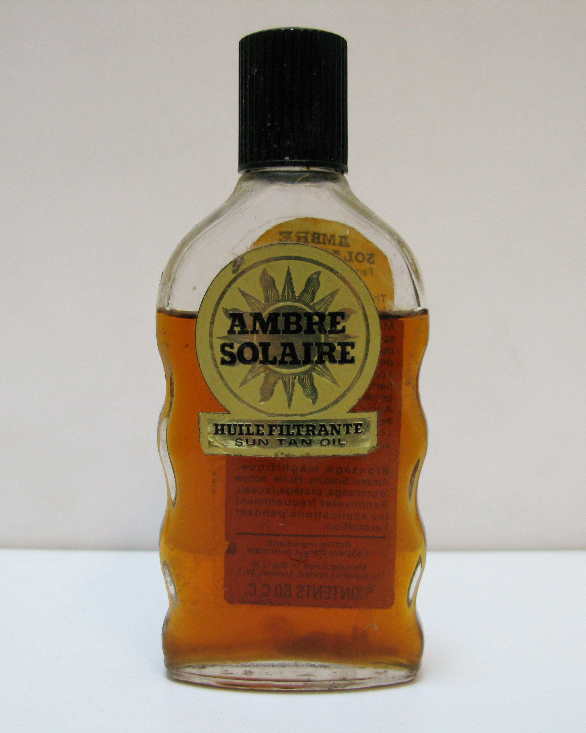 Bottle of Ambre Solaire, c. 1960, on loan Royal Pharmaceutical Society of Great Britain