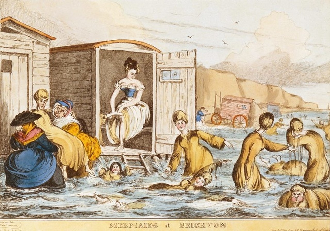 ‘Mermaids of Brighton’ by William Heath, 1829, showing bathing machines and ‘Dippers’ helping bathers into sea