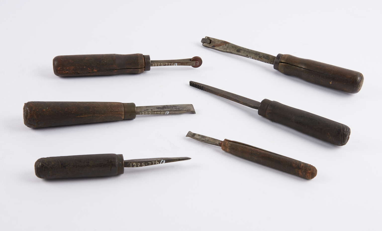 Eight eighteenth century hand tools, including 5 inside chassers, 1 inside cleaning tool, 1 knurling tool and 1 roller burnishing tool.