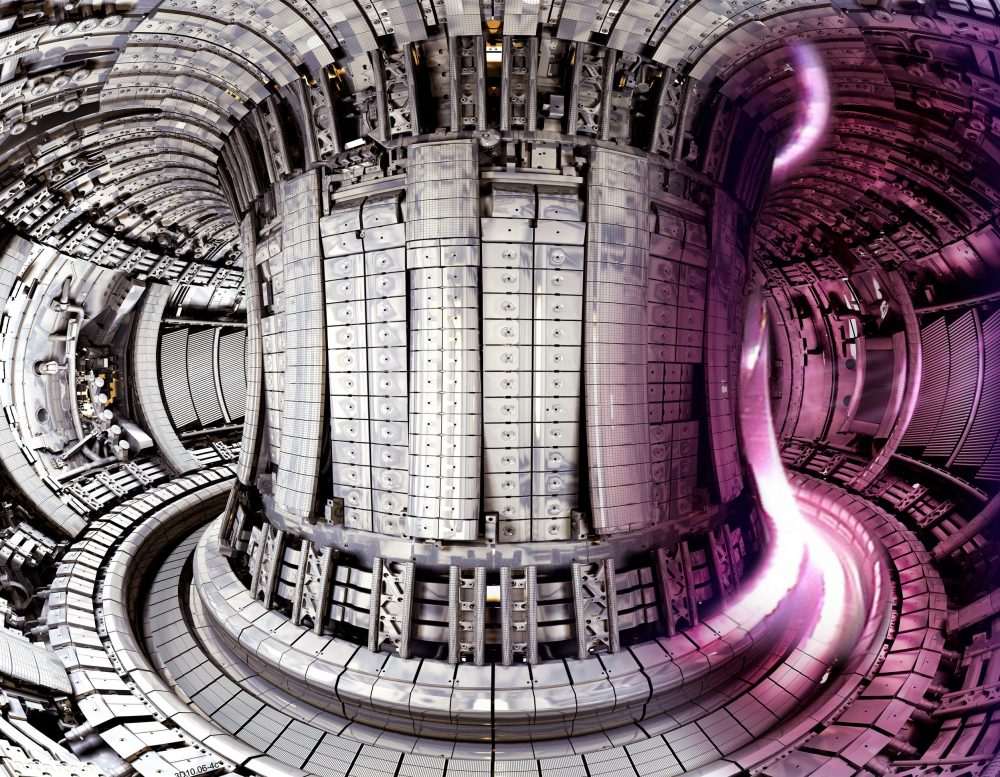 Interior of the JET fusion experiments, showing a fusion plasma (right). Credit EUROfusion