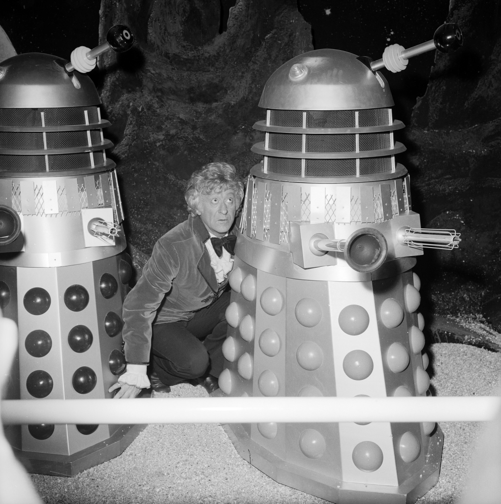 Doctor Who cast member Jon Pertwee in character with the Daleks at the opening of the BBC TV Visual Effects exhibition at the Science Museum, London, 1972