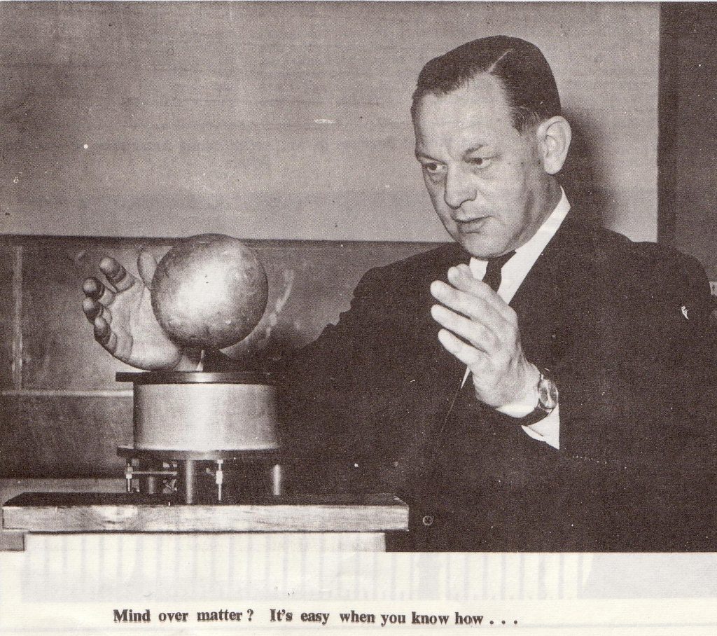 Eric Laithwaite in 1967 performing one of his Christmas Lectures demonstrations, levitating metal sphere. Credit: The College Archives Imperial College London