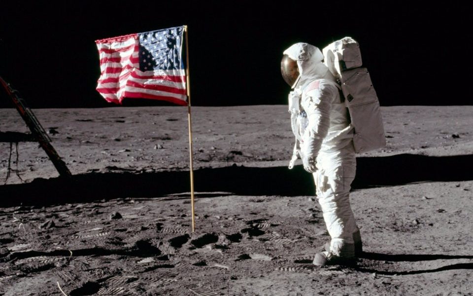 Apollo-11-astronaut-Buzz-Aldrin-stands-next-to-a-flag-on-the-moon-on-July-20-1969.-NASA-960x600.jpg