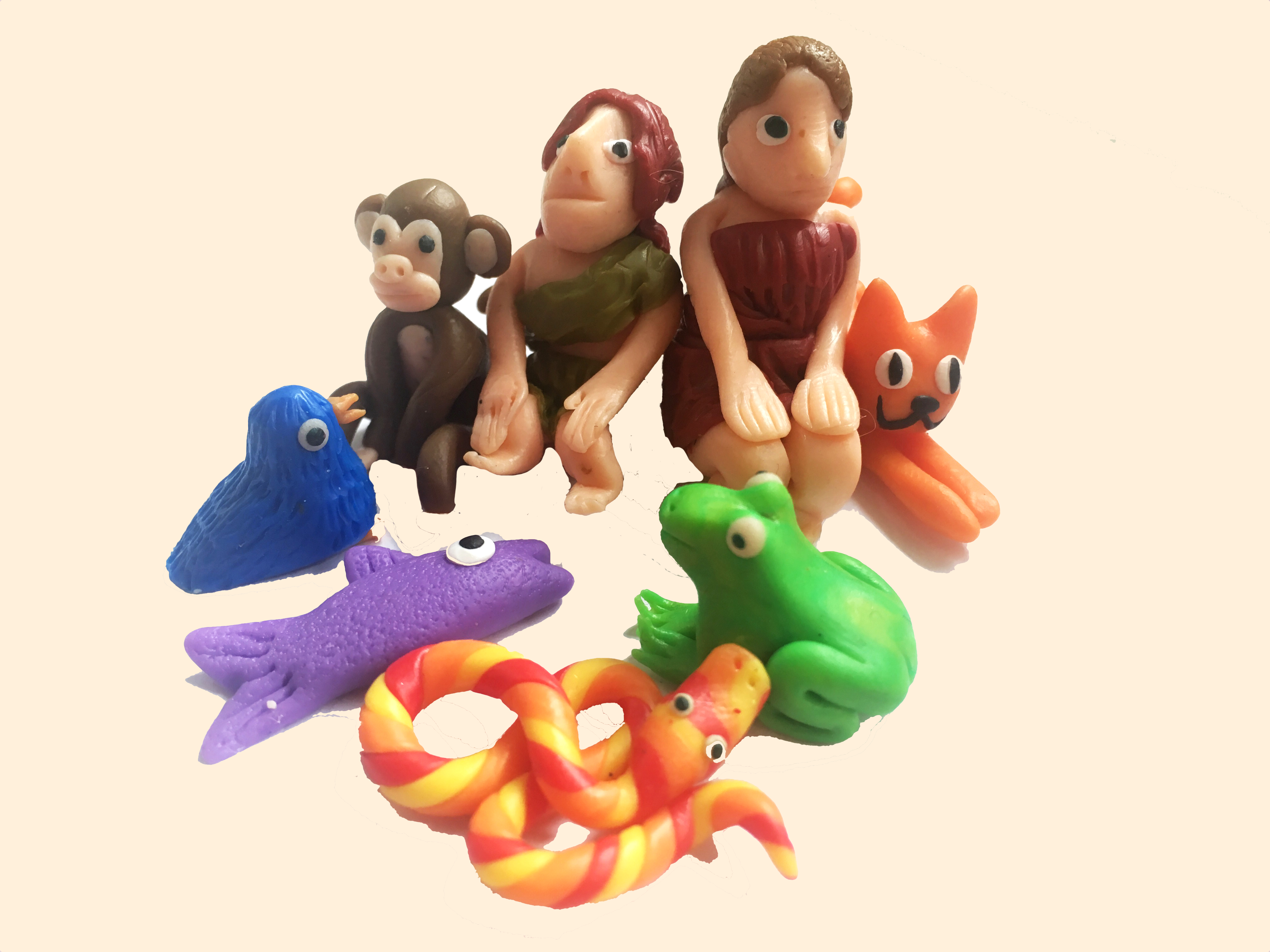 2 humans, a monkey, a bird, a cat, a frog, a fish and a snake made out of bright coloured modelling clay. 