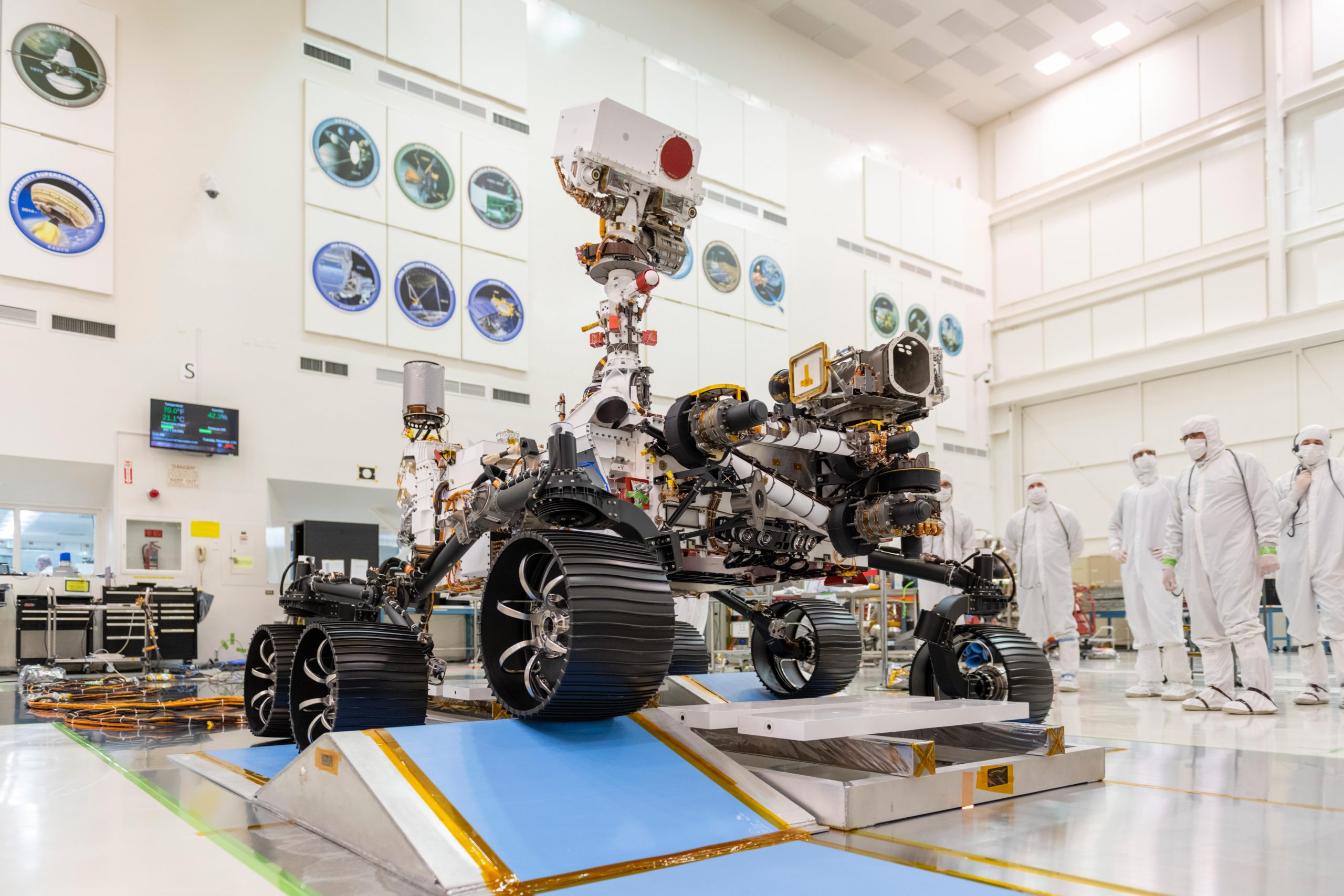 Image showing Mars rover in one of NASA's laboratories with engineers