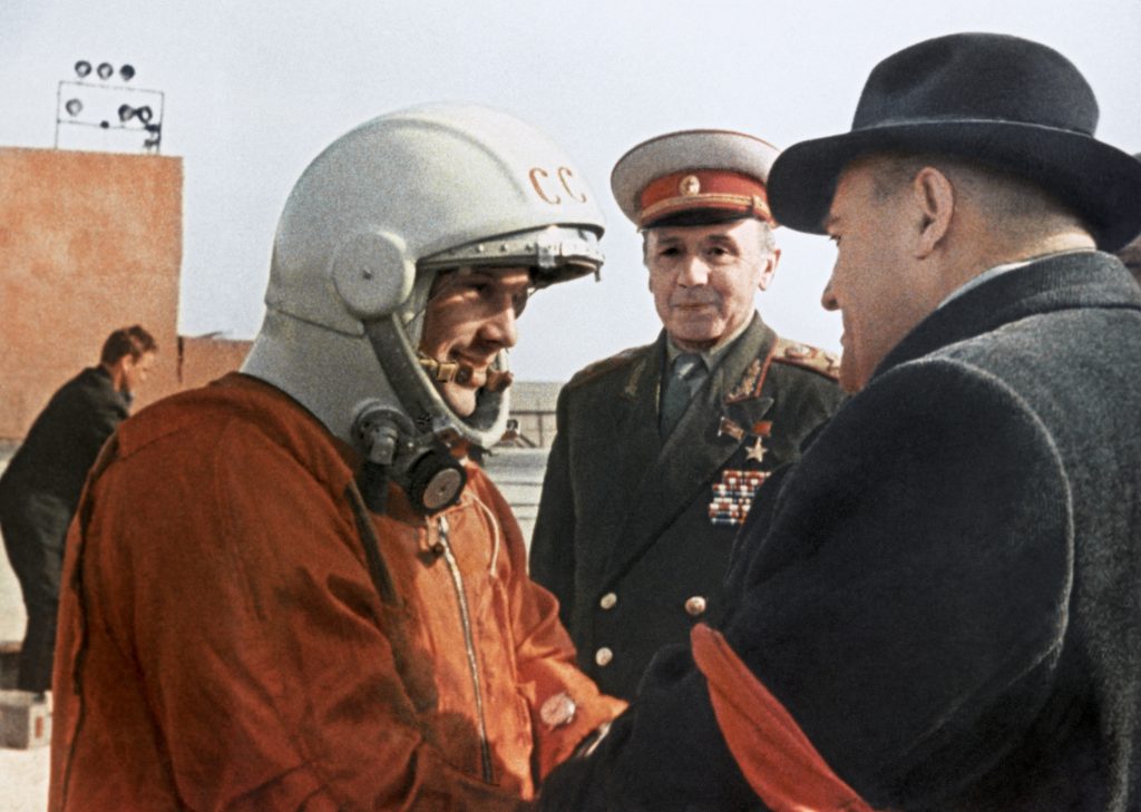 Soviet space programme Chief Designer Sergei Korolev wishing cosmonaut Yuri Gagarin, who is wearing his spacesuit, well before his mission in 1961.