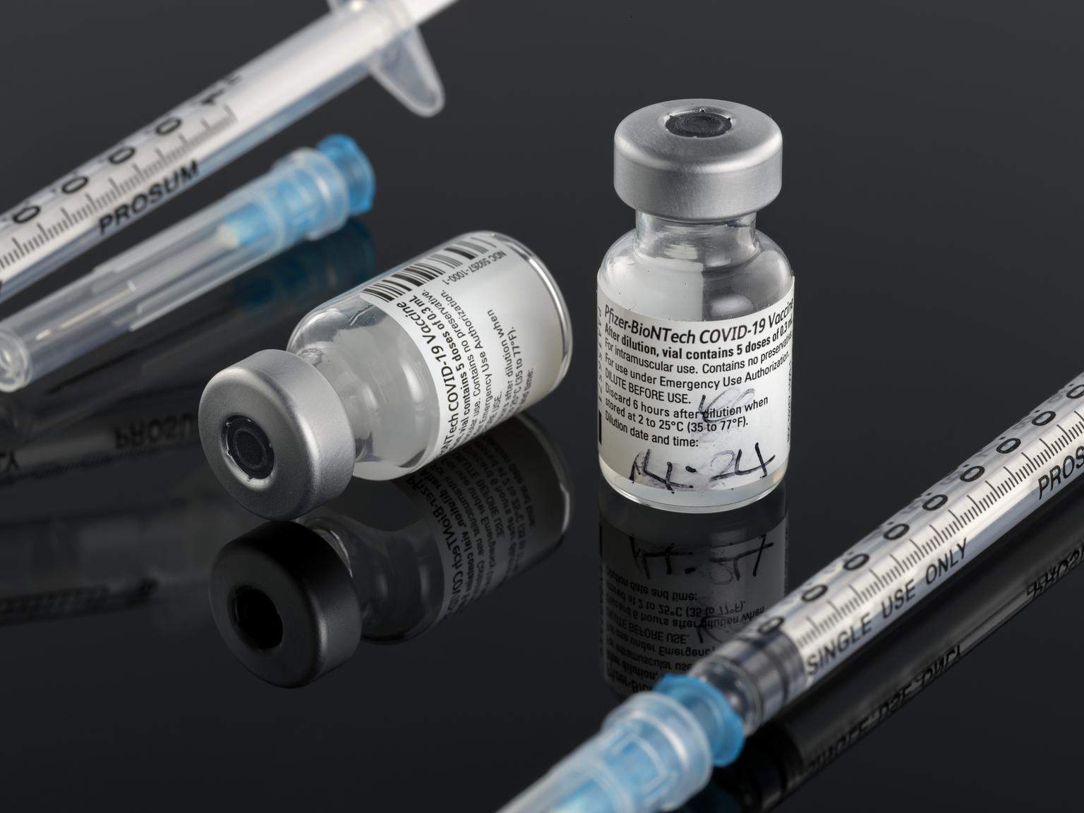 Empty glass vial that contained the Pfizer-BioNTech vaccine against COVID-19 given to the first individual vaccinated in the UK's mass vaccination campaign, Margaret Keenan, on 8 December 2020. 