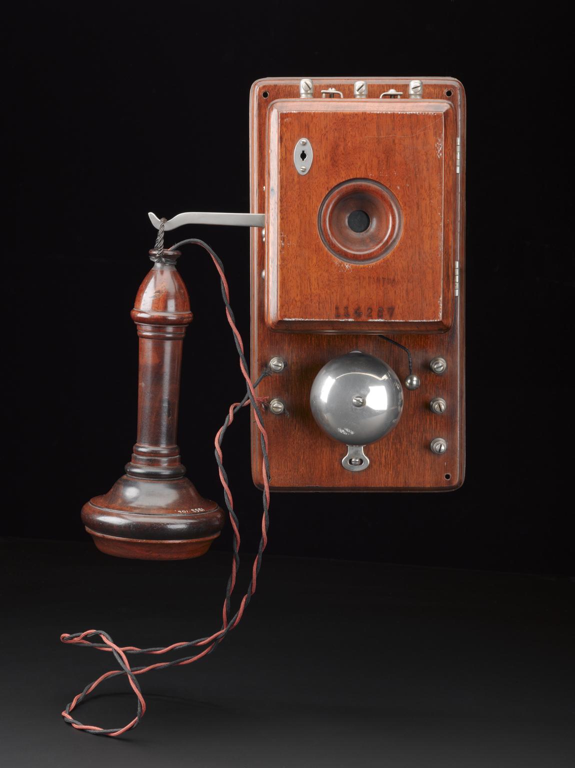 Bell telephone receiver, mahogany case, made by the India Rubber, Gutta-Percha and Telegraph Works Company Limited, Silvertown, Newham, London, England, 1878.