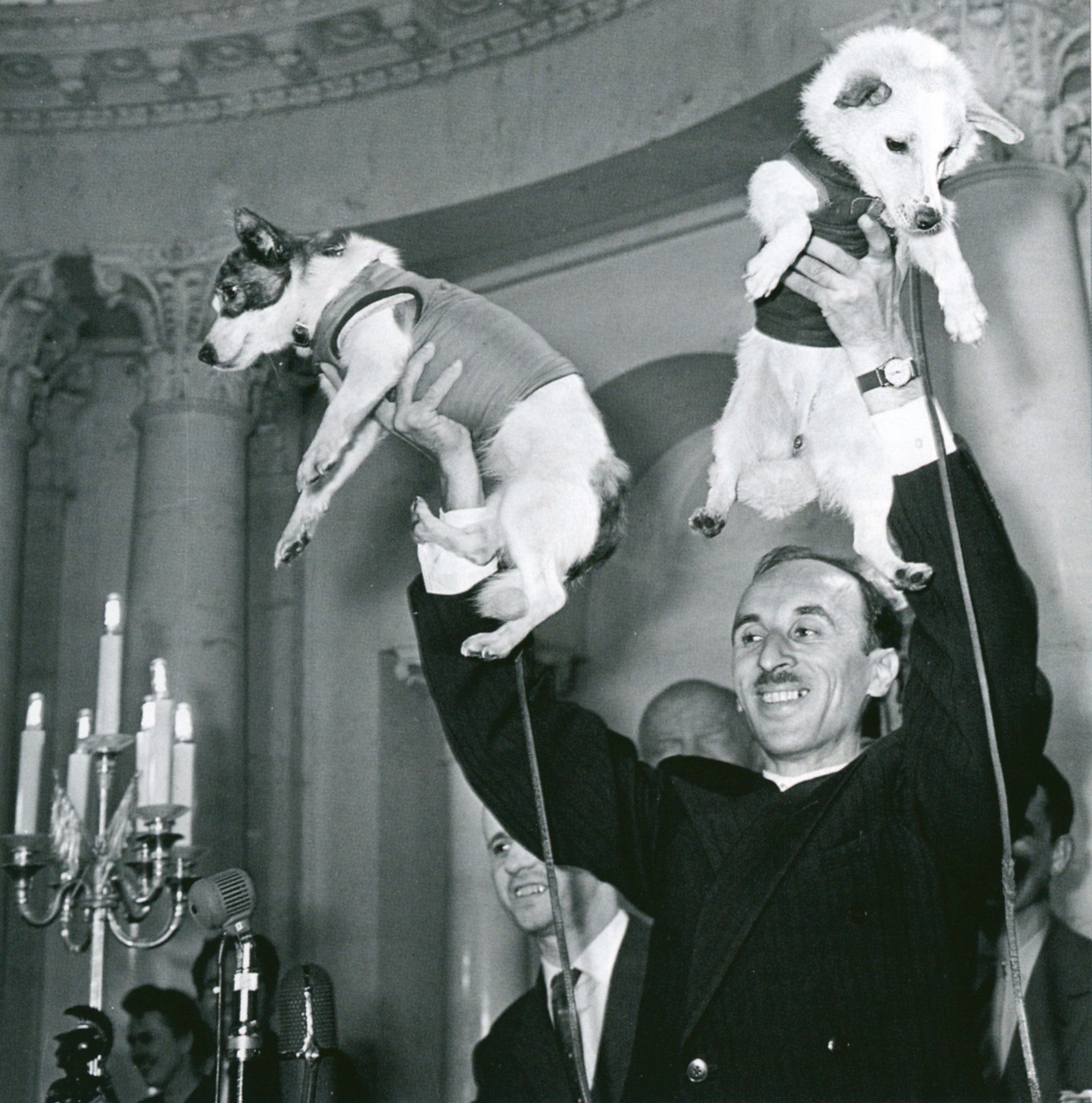 Belka and Strealka in the arms of Oleg Gazenko, following their day-long space flight, 1960. Credit: Institute of Biomedical Problems, Moscow.