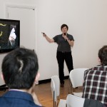 Artist Heather Barnett works with slime mould (on screen), which forms intelligent networks to find food (oats). Credit: Science Museum.