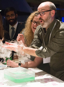 A guest experimenting at the Chemistry Bar.