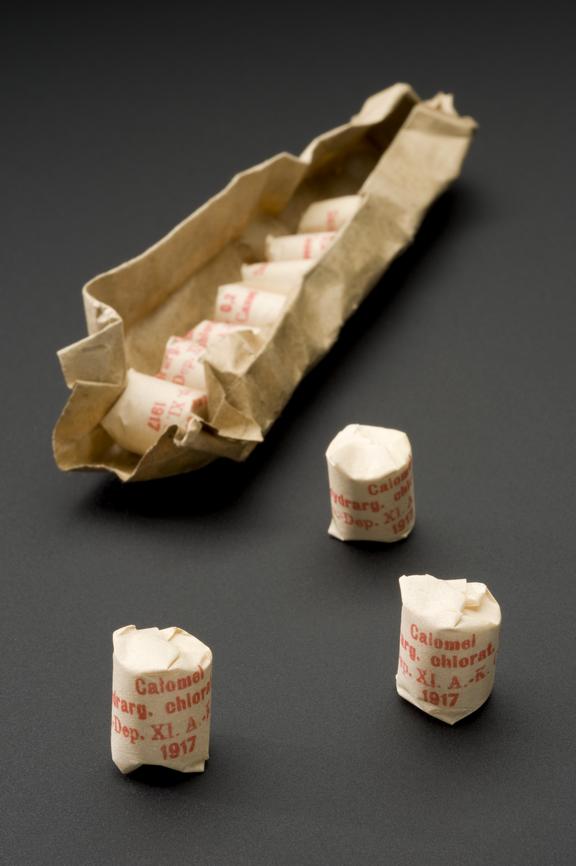 10 packets of mercurous chloride tablets in wrapping paper.