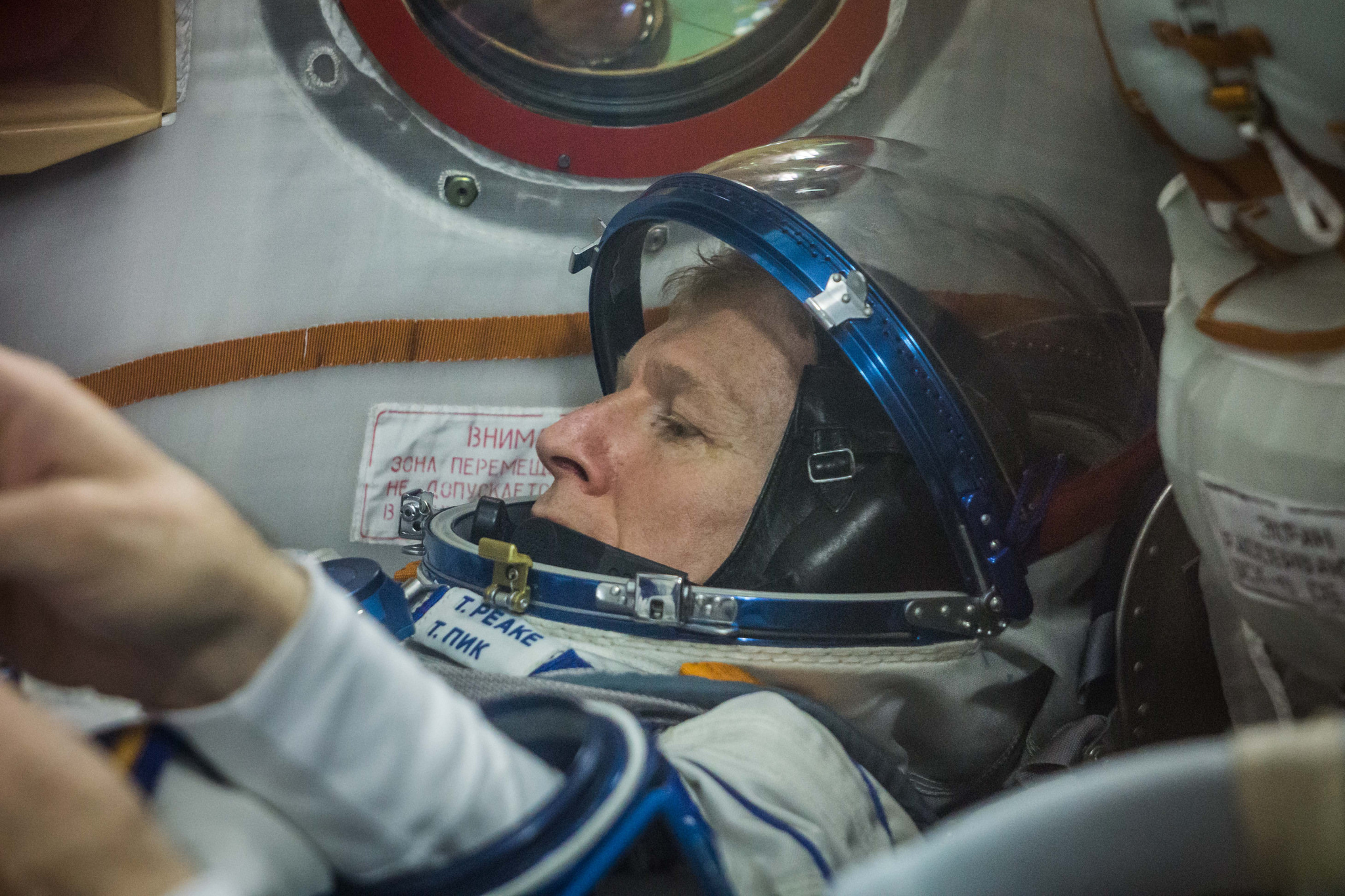 Checking the Sokol suit fits. 