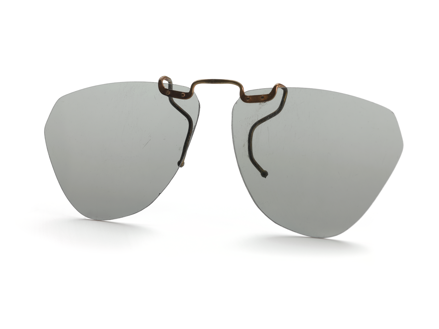 Pair of clip-on polaroid overclip sunglasses in plastic wallet, Boots, England, c.1977