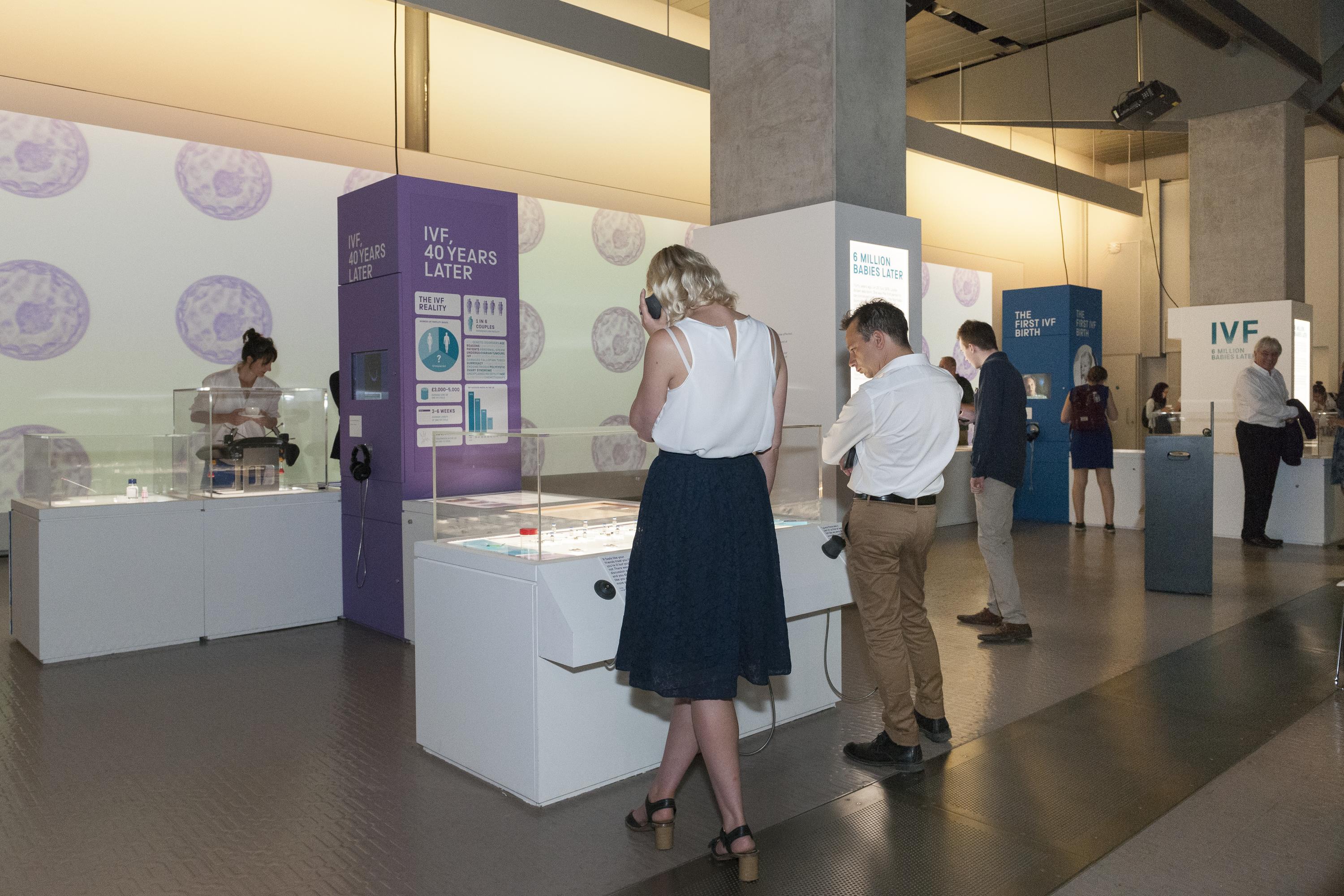 Invited guests attending IVF: 6 Million Babies Later. An exhibition marking the 40th anniversary of the 'miraculous' birth of Louise Brown on 25 July 1978. The exhibition explores the ten years of testing, hundreds of failed attempts and many setbacks faced by Robert Edwards, Patrick Steptoe and Jean Purdy, in their quest to treat infertility and achieve the first successful IVF birth.