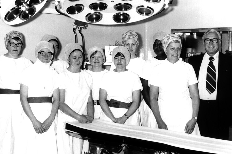Nurses in the theatre at Oldham and District General Hospital. Back row: Edith Astall, Lorna Jones, Sandra Marr, Jennifer Thompson and Olga Brewster. Front row: Sandra Corbett, Noni Fallows, Margory Travis, Muriel Harris and Patrick Steptoe. Image: John Fallows