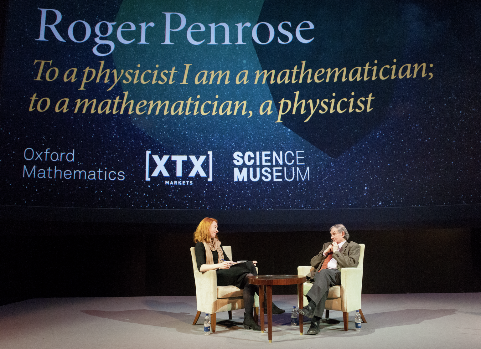 Sir Roger Penrose and Hannah Fry at Oxford Mathematics London Public Lecture: 'To a physicist I am a mathematician; to a mathematician, a physicist'