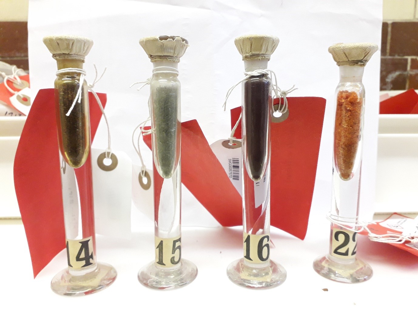 Samples of azobenzene-based dyes made by Micklethwait and Morgan (from left to right): aniline yellow, chrysoidine, Manchester brown and azobenzene.