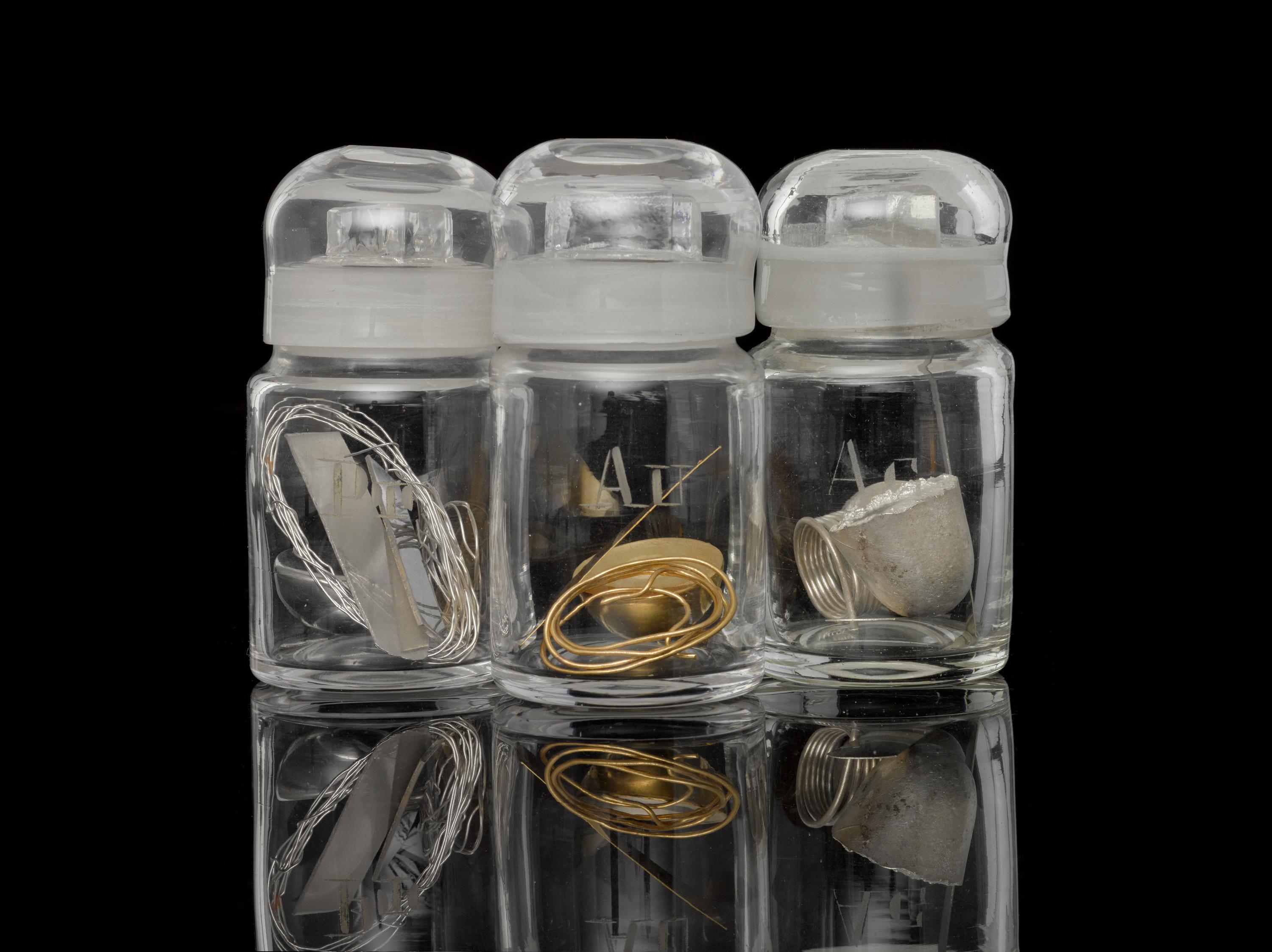 Bottles containing (l-r) platinum, gold and silver, now part of the Science Museum Group Collection. 