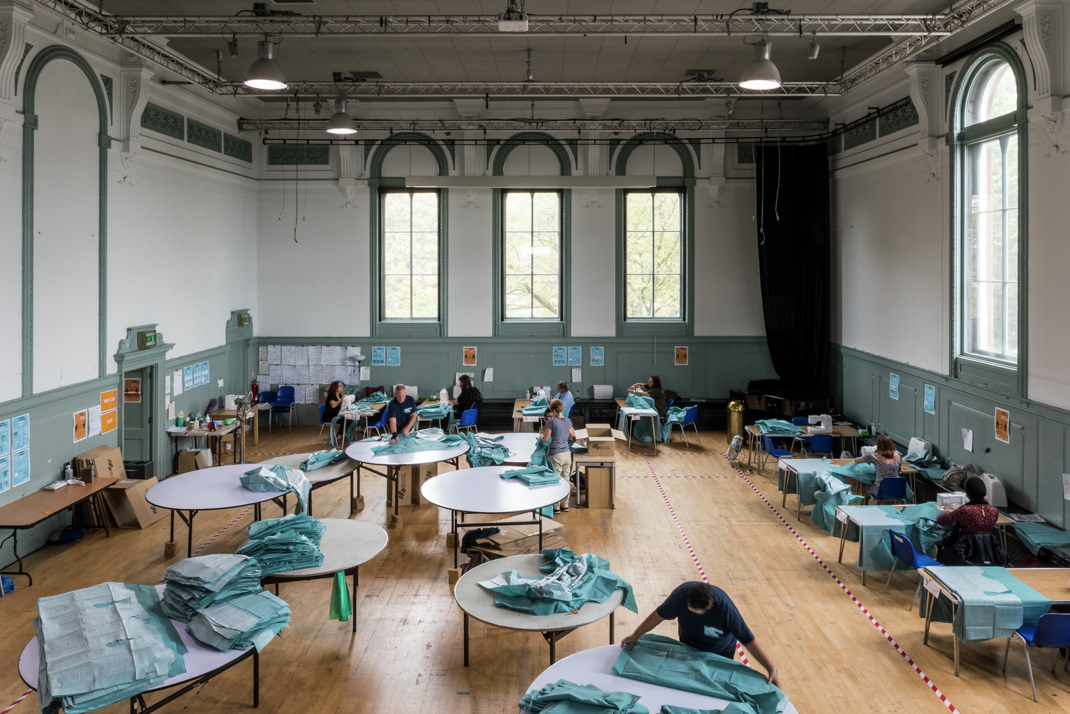 Volunteers sewing surgical gowns for the Royal Free Hospital and Barnet Hospital at the Hampstead Gown Factory during the Covid-19 pandemic.