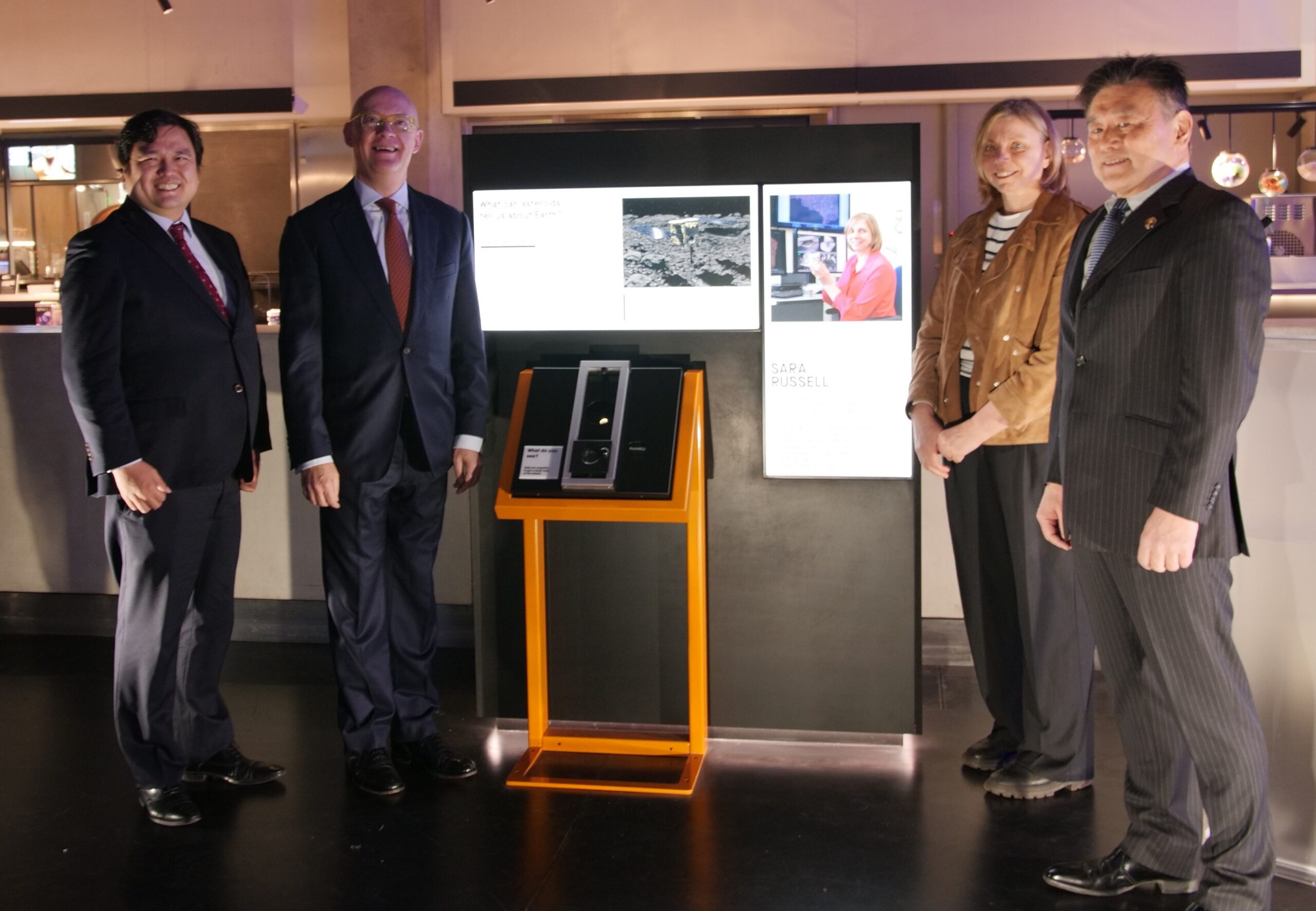 From an Asteroid Grain to Earth and a Thousand Distant Skies